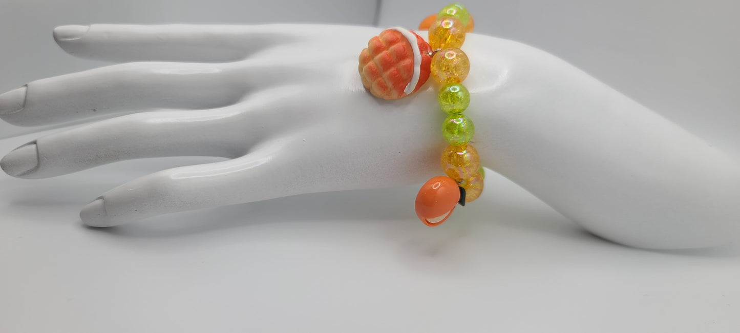 Orange and Green Beaded Elastic Bracelet with Orange and Pastry Bread Charms