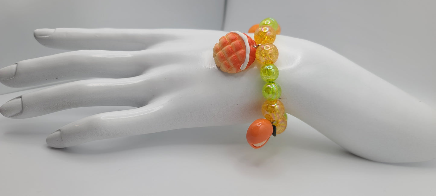 Orange and Green Beaded Elastic Bracelet with Orange and Pastry Bread Charms