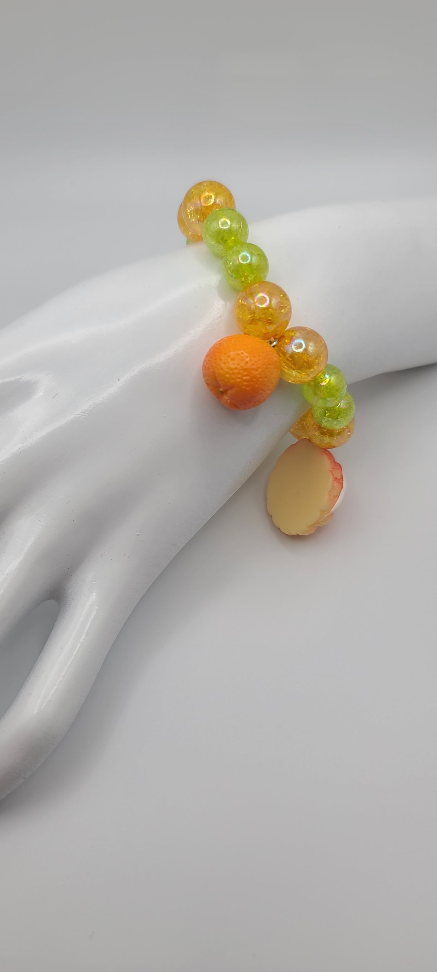 Orange and Green Beaded Elastic Bracelet with Orange and Pastry Bread Charms