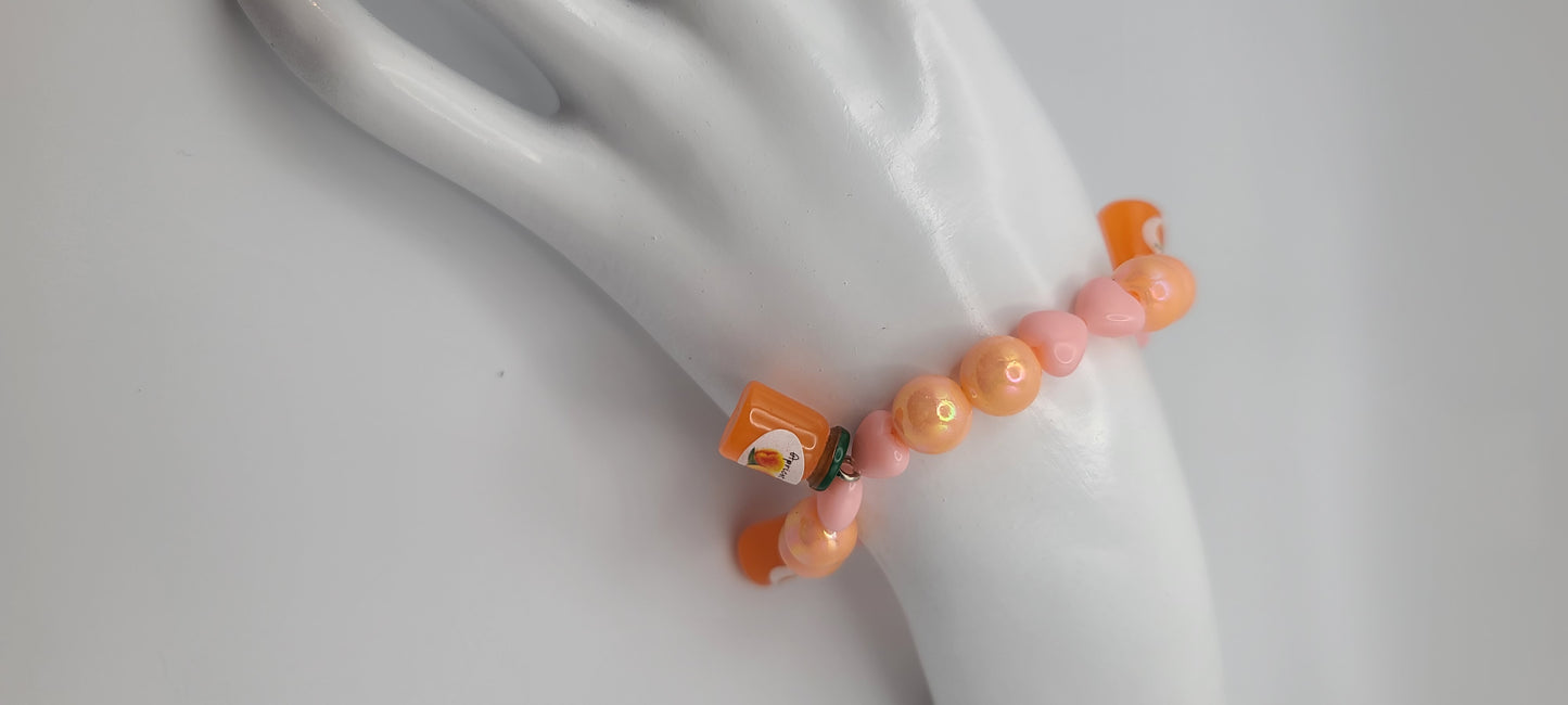 Orange and Peach Beaded Elastic Bracelet with Peach Jam and Heart Macaron Charms