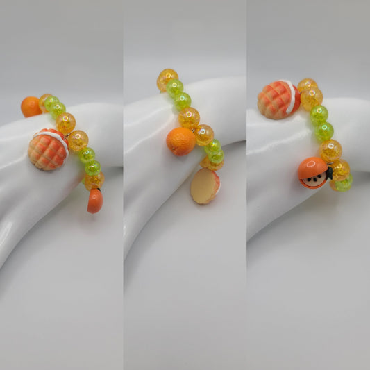 Orange and Green Beaded Elastic Bracelet with Orange and Pastry Bread Charms